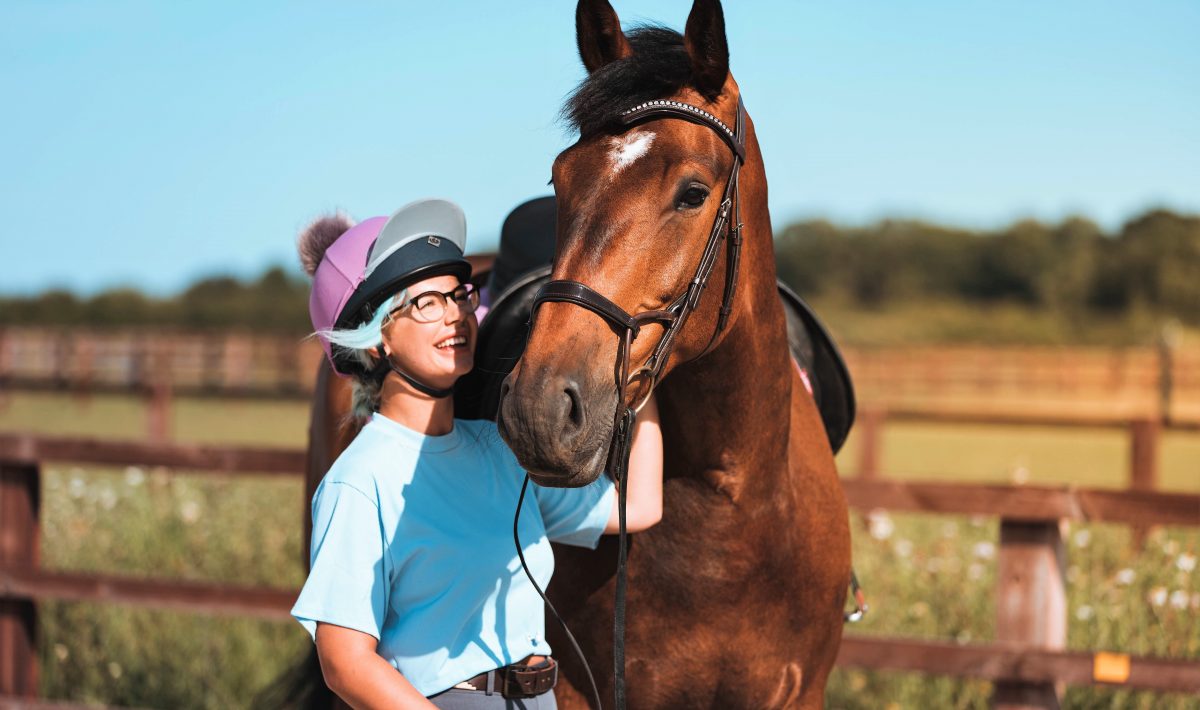 Bay sport horse with owner Jade