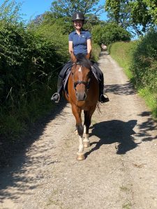 Riley and I hacking along the lane on the farm estate