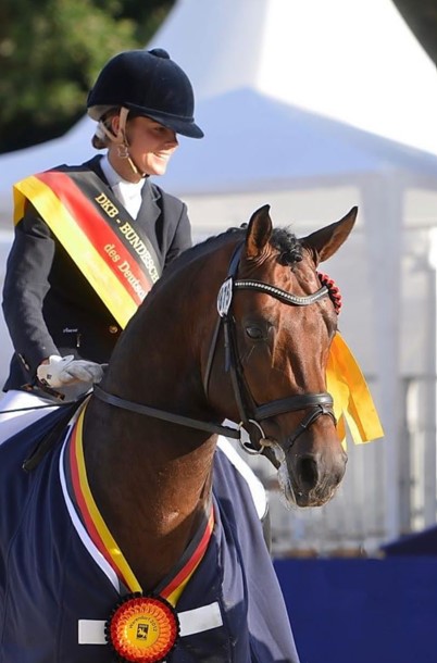 Johanna Klippert riding a four year old German champion Franziskus